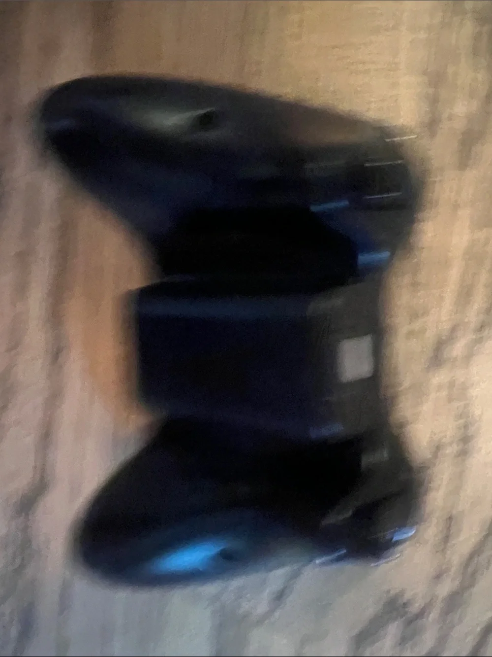 Black Wireless Game Controller with Colored Action Buttons